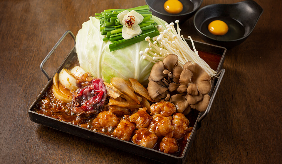 きのこバター醤油の鉄板焼き大とろホルモン〈一人前〉